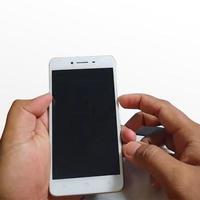 hand- Holding slim telefoon - materiaal voor maken apparaat mockup foto