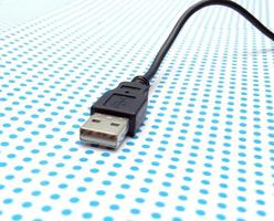 USB kabel Aan stippel achtergrond foto