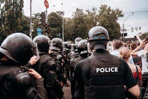 Politie dwingen naar in stand houden bestellen in de Oppervlakte gedurende de rally foto