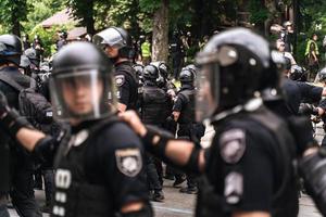 Politie dwingen naar in stand houden bestellen in de Oppervlakte gedurende de rally foto