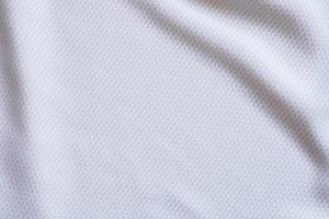 witte voetbaltrui kleding stof textuur sportkleding achtergrond foto