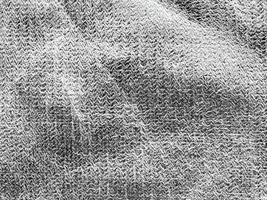 achtergrond van glimmend grijs kleding stof foto