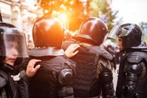 Politie dwingen naar in stand houden bestellen in de Oppervlakte gedurende de rally foto