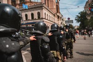Politie dwingen naar in stand houden bestellen in de Oppervlakte gedurende de rally foto