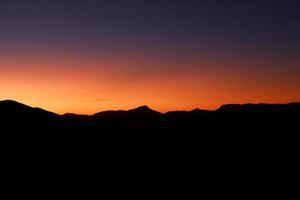 oranje en Purper zonsondergang foto