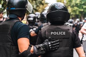 Politie dwingen naar in stand houden bestellen in de Oppervlakte gedurende de rally foto