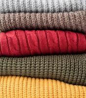 stack van herfst warm truien foto