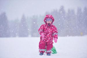 familie in winterlandschap foto