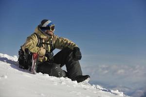 skiërs Aan berg foto