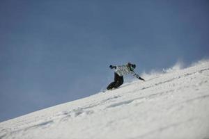 skiërs Aan berg foto