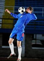 Amerikaans voetbal speler in actie foto