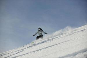 skiërs Aan berg foto