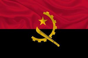 3d vlag van Angola Aan kleding stof foto
