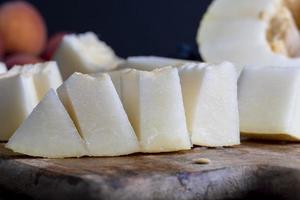 rijp heerlijk meloen gedurende toetje Koken foto