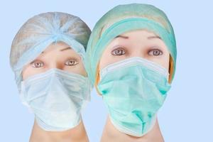 dummy dokter hoofden vervelend textiel chirurgisch pet en masker foto