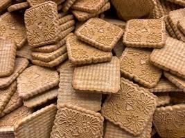 een veel van heerlijk zoet biscuits van plein vorm geven aan. foto