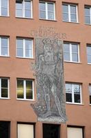 München, duitsland, 2014. st onuphrius Aan een rood muur in München foto