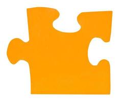 een oranje papier stuk van decoupeerzaag puzzel foto