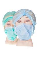 dummy dokter hoofden vervelend textiel chirurgisch pet en masker foto