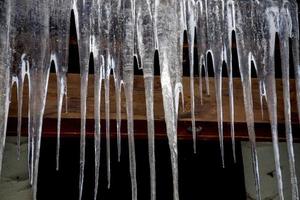 ijspegels Aan huis in winter foto