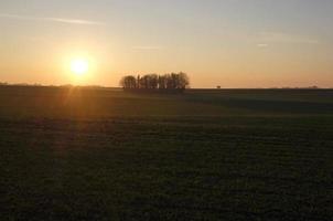 zonsopkomst in de Duitse platteland foto