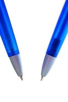 twee blauw pennen foto