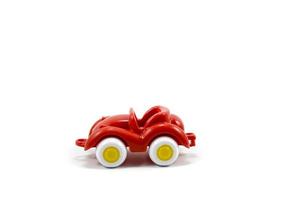 retro auto Open dak plastic speelgoed- rood verf geïsoleerd Aan wit foto