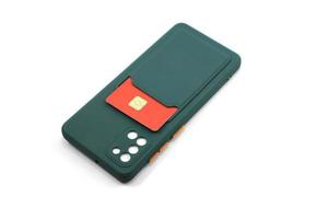 twee blauw en donker groen telefoon gevallen voor smartphones met credit kaart opslagruimte foto