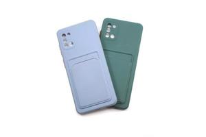 twee licht blauw en donker groen gevallen voor telefoon covers voor smartphones foto
