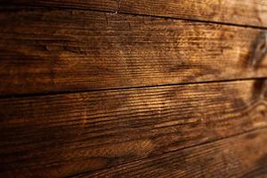 wijnoogst gekleurde hout achtergrond structuur met knopen en nagel gaten. oud geschilderd hout muur. houten donker horizontaal planken. voorkant visie met kopiëren ruimte.