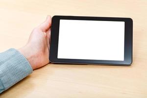 zakenman hand- en tablet met geïsoleerd scherm foto