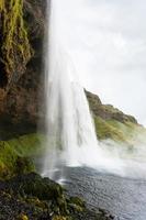 kant visie water stromen van seljalandsfoss waterval foto