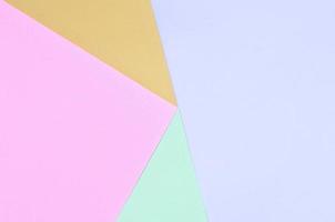 structuur achtergrond van mode pastel kleuren. roze, paars, oranje en blauw meetkundig patroon papieren. foto