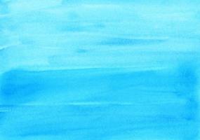 waterverf licht blauw achtergrond structuur hand- geschilderd. aquarel helder turkoois abstract achtergrond. borstel beroertes Aan papier. foto