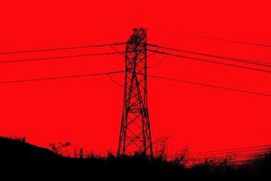 silhouet elektrisch torens ondersteunen koper kabels naar vervoer elektrisch energie foto
