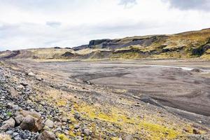 rivier- bed van solheimajokull gletsjer in IJsland foto