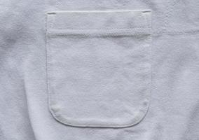 detailopname zak- Aan wit katoen overhemd foto