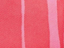 textiel achtergrond - rood en roze zijde kleding stof foto