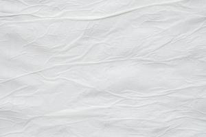 blanco wit verfrommeld gevouwen gescheurd papier poster structuur oppervlakte achtergrond foto