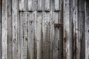 grijs houten verticaal planken bord oppervlakte structuur en achtergrond foto