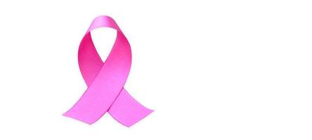 geïsoleerd roze lint, symbool van vrouw borst kanker bewustzijn campagne in oktober, met knipsel paden. foto