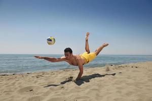 mannetje strand volleybal spel speler foto