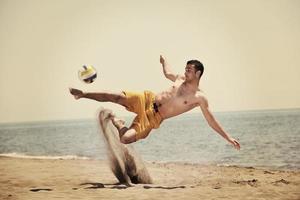 mannetje strand volleybal spel speler foto