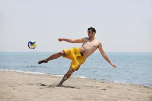 mannetje strand volleybal spel speler foto