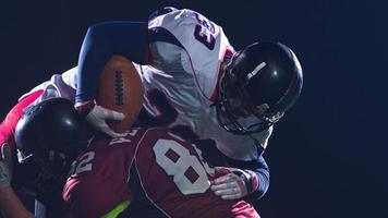 Amerikaans Amerikaans voetbal spelers in actie foto