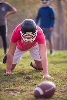 Amerikaans Amerikaans voetbal speler in actie foto