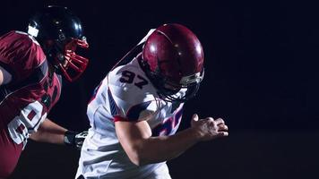 Amerikaans Amerikaans voetbal spelers in actie foto