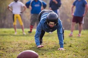 Amerikaans Amerikaans voetbal speler in actie foto