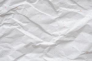 wit verfrommeld en gevouwen recycle papier structuur achtergrond foto