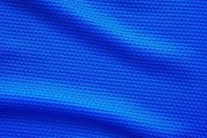 blauw Amerikaans voetbal Jersey kleding kleding stof structuur sport- slijtage achtergrond, dichtbij omhoog top visie foto
